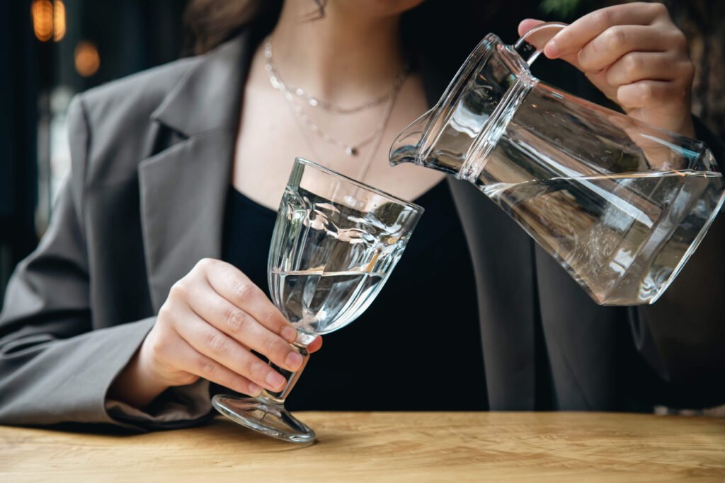 A women pours water