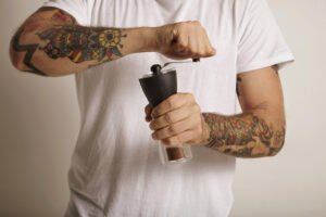 A young man have tattoo on his chest