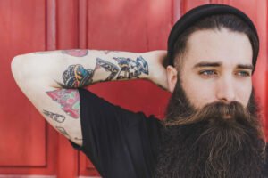 Young man with colorful tattoo