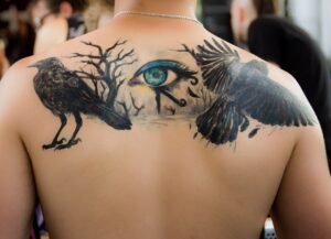 A man having tattoo on his back