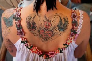 A girl with tattoo in her back