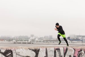 Man sprinting rooftop