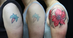 Three man hands with red in tattoo fading