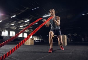 Young man doing exercise After Tattoo Removal